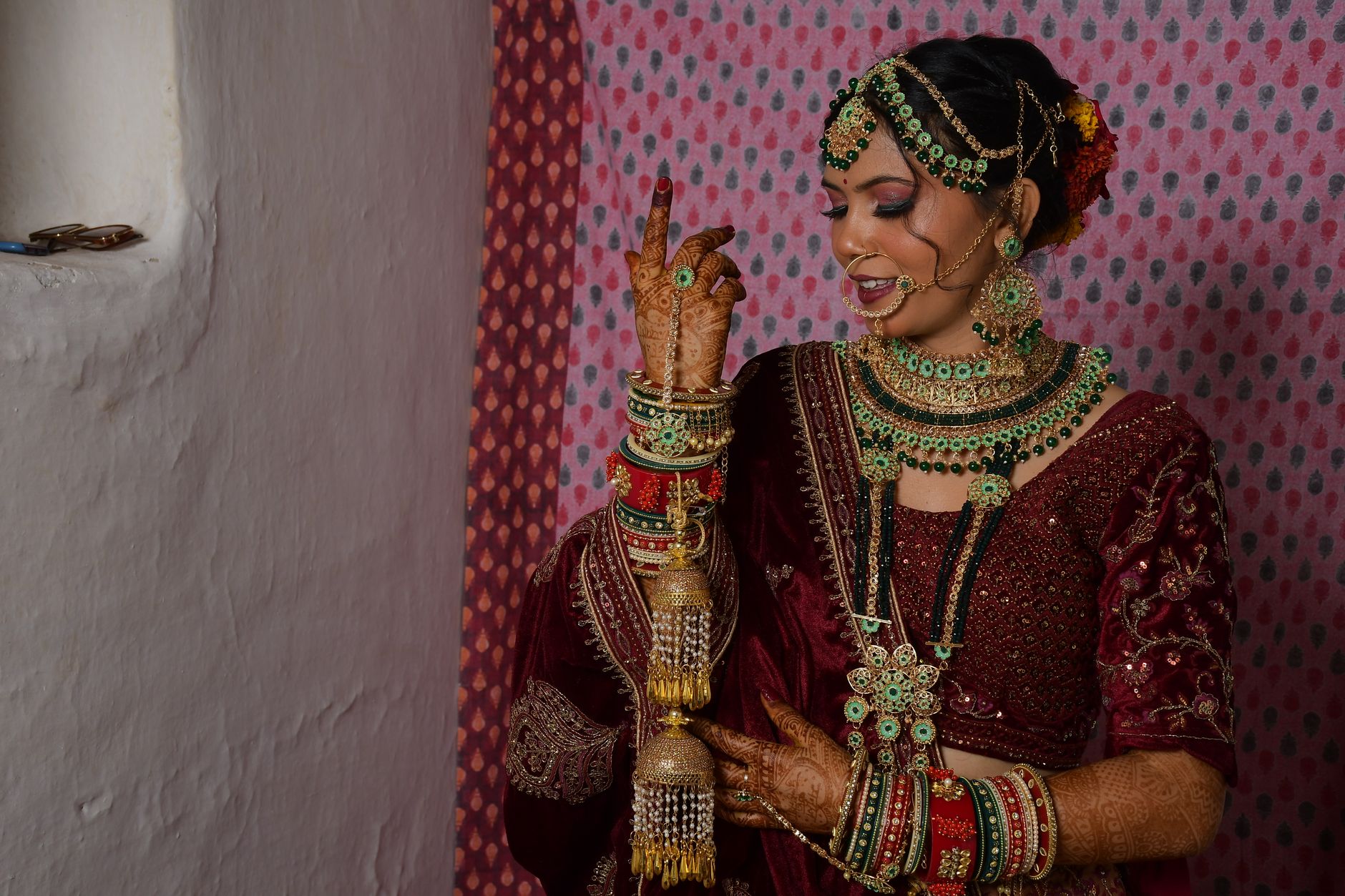 Elegant South Asian bride adorned in intricate bridal jewelry and attire, showcasing cultural beauty. — Luxury Gifts For Wife