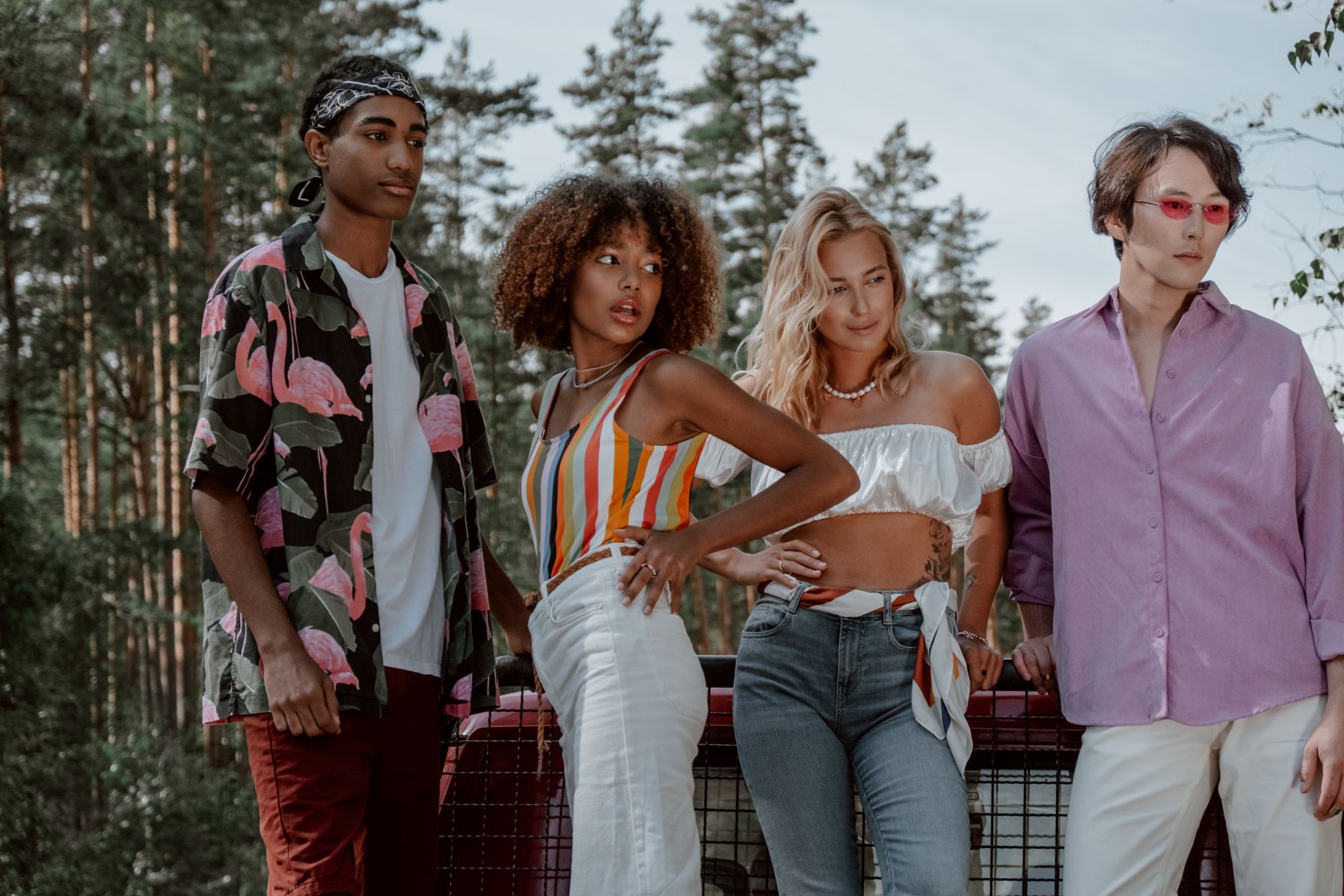 Group of diverse friends posing fashionably outdoors in summer attire. — Mats for Your Salon: Why These are Necessary